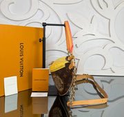 LOUIS VUITTON — Monogram Shoulder Bag with Yellow Detail — image 1