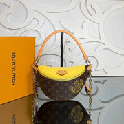 LOUIS VUITTON — Monogram Shoulder Bag with Yellow Detail — image 6