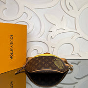 LOUIS VUITTON — Monogram Shoulder Bag with Yellow Detail — image 3