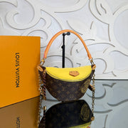 LOUIS VUITTON — Monogram Shoulder Bag with Yellow Detail — image 7